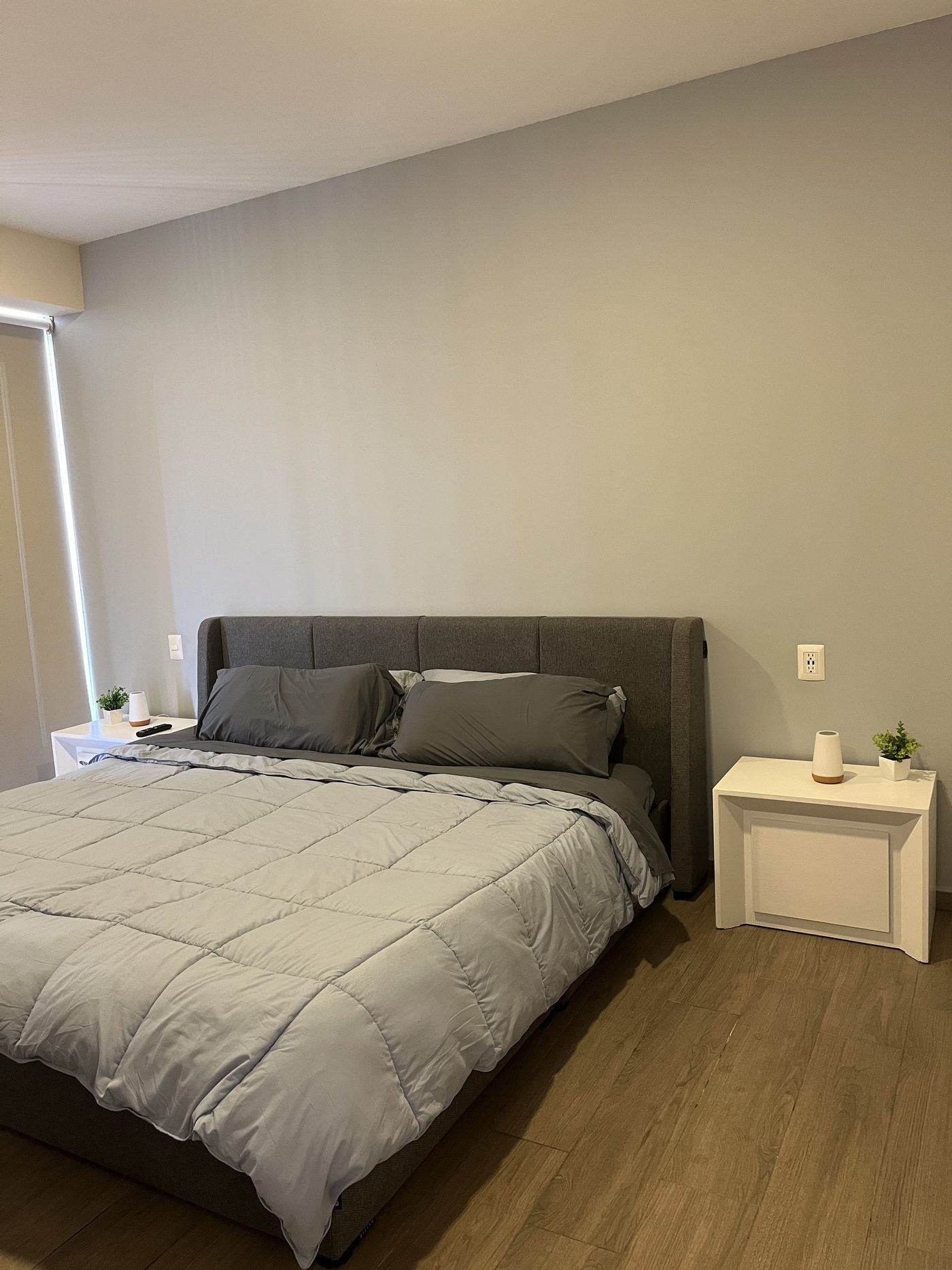 Bedroom with king bed, wide view